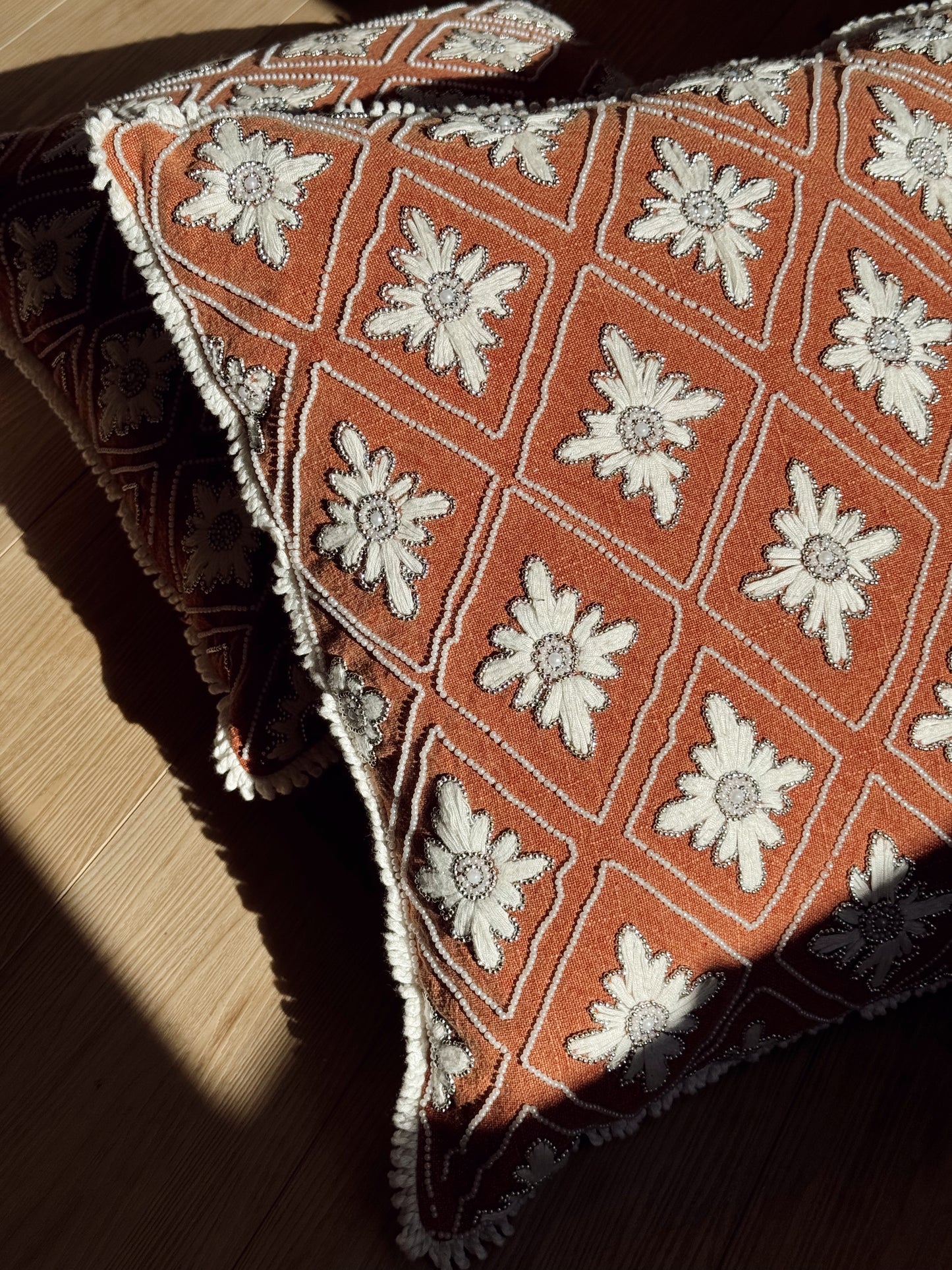 Terracotta Diamond Embroidered Pillow with White Floral Motif