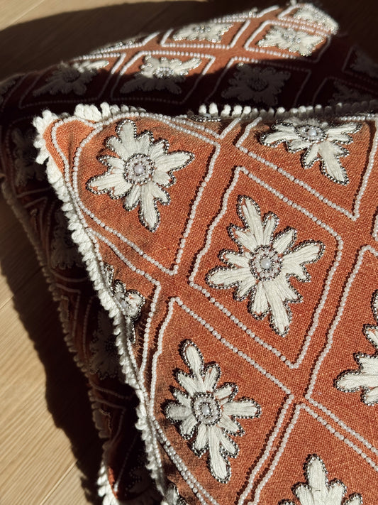Terracotta Diamond Embroidered Pillow with White Floral Motif
